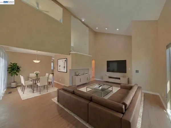 a view of a kitchen cabinets and wooden floor