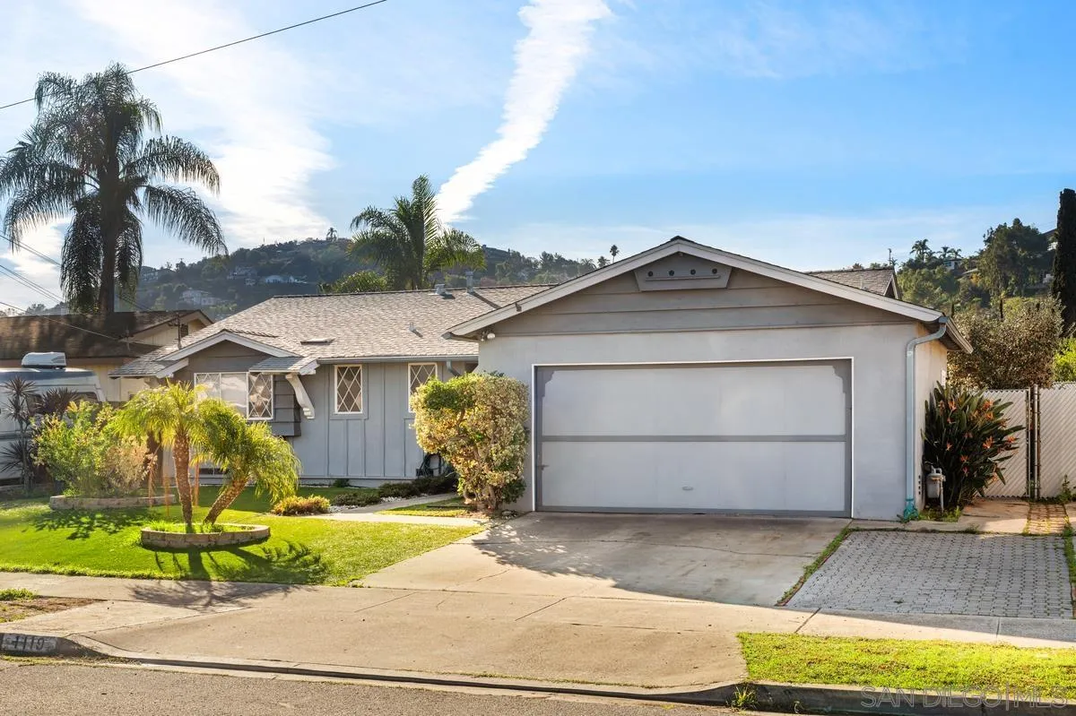 1119 Buckskin Road El Cajon, CA 92019 - Photo 1 of 27 a front view of a house with a garage