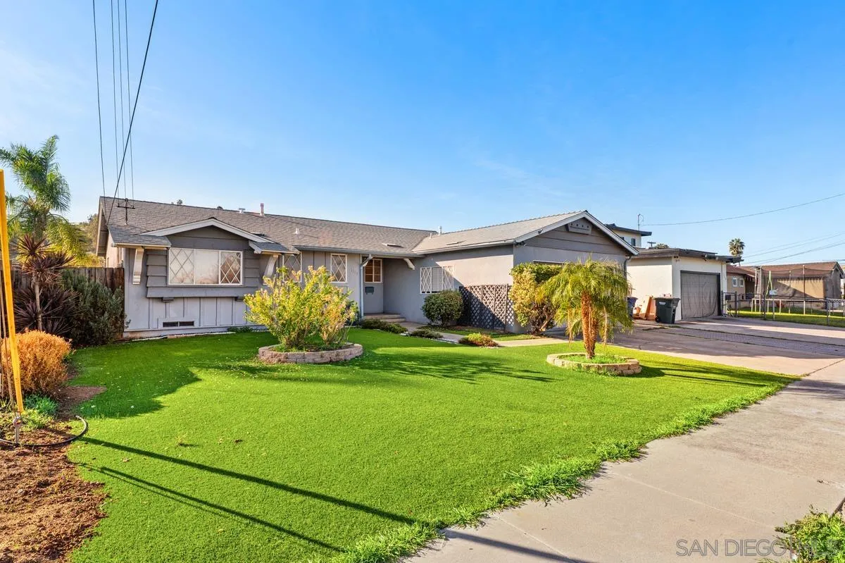 1119 Buckskin Road El Cajon, CA 92019 - Photo 2 of 27 a front view of a house with garden