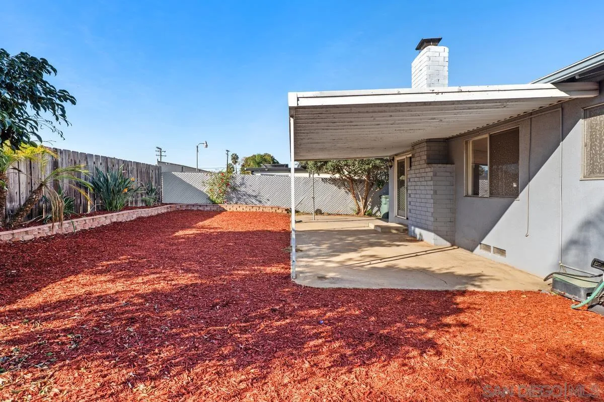 1119 Buckskin Road El Cajon, CA 92019 - Photo 26 of 27 a view of a house with backyard and trees