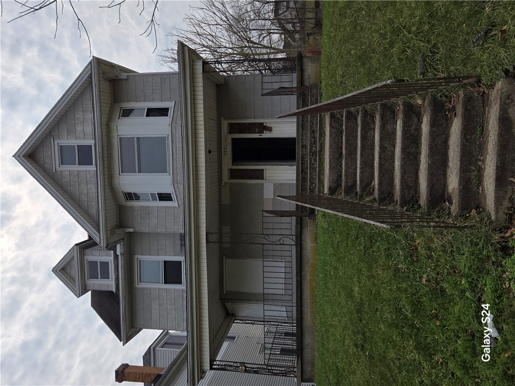 727 West High Street Springfield, OH 45506 - Photo 1 of 29 This classic dwelling presents a symmetrical facade with a welcoming entrance.
