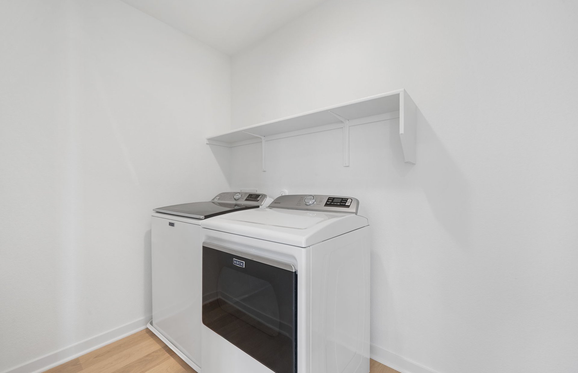 608 Rubber Tree Way Buda, TX 78610 - Photo 23 of 29 a utility room with dryer and washer