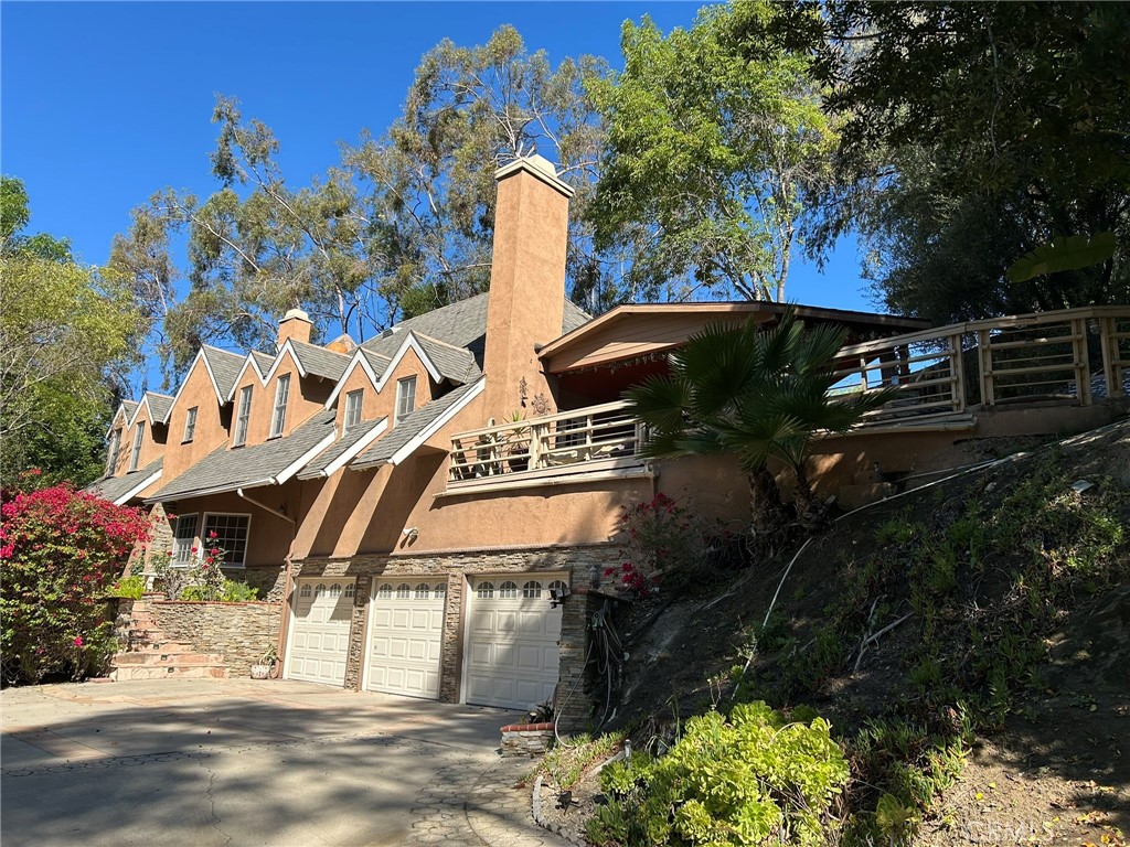 300 South Timken Road Anaheim, CA 92808 - Photo 1 of 40 a front view of a house with a yard