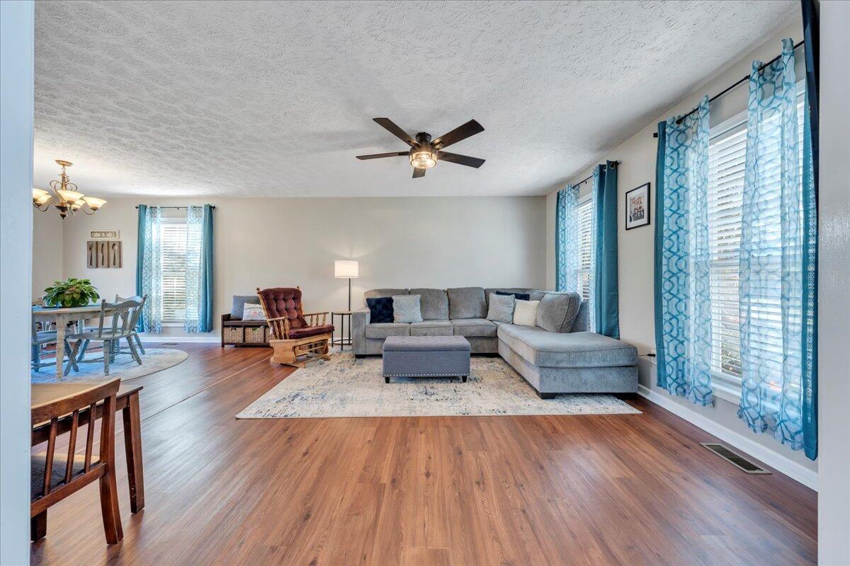 780 Farmington Road Hardy, VA 24101 - Photo 13 of 50 a living room with furniture and wooden floor