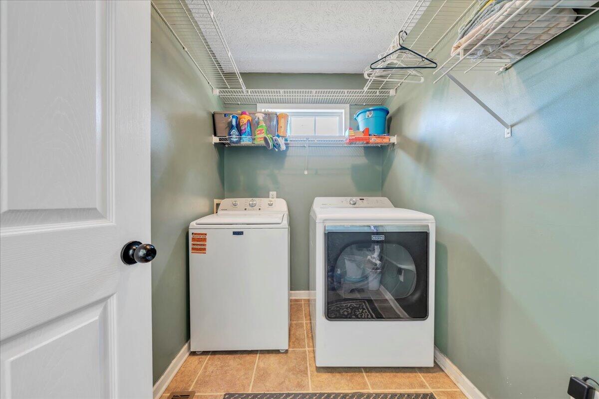 780 Farmington Road Hardy, VA 24101 - Photo 26 of 50 a utility room with dryer and washer