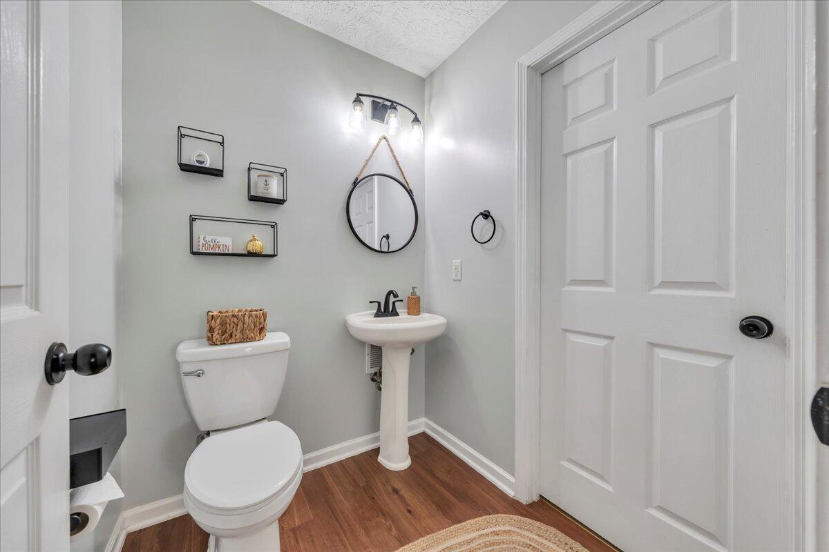 780 Farmington Road Hardy, VA 24101 - Photo 27 of 50 a bathroom with a toilet a sink and a mirror