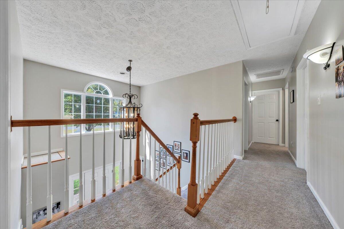 780 Farmington Road Hardy, VA 24101 - Photo 28 of 50 a view of a hallway with windows