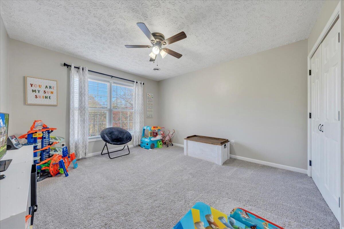 780 Farmington Road Hardy, VA 24101 - Photo 30 of 50 a view of room with toys and a chandelier