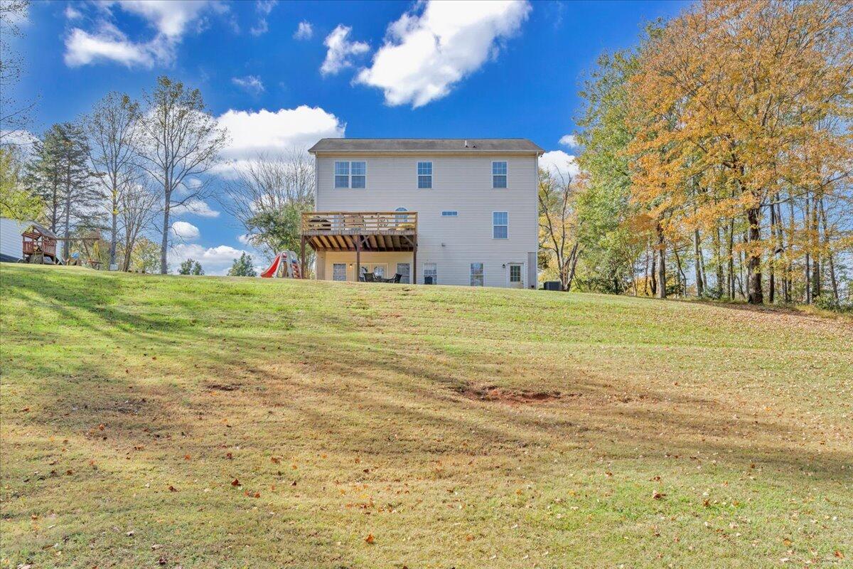 780 Farmington Road Hardy, VA 24101 - Photo 41 of 50 a view of a house with a yard