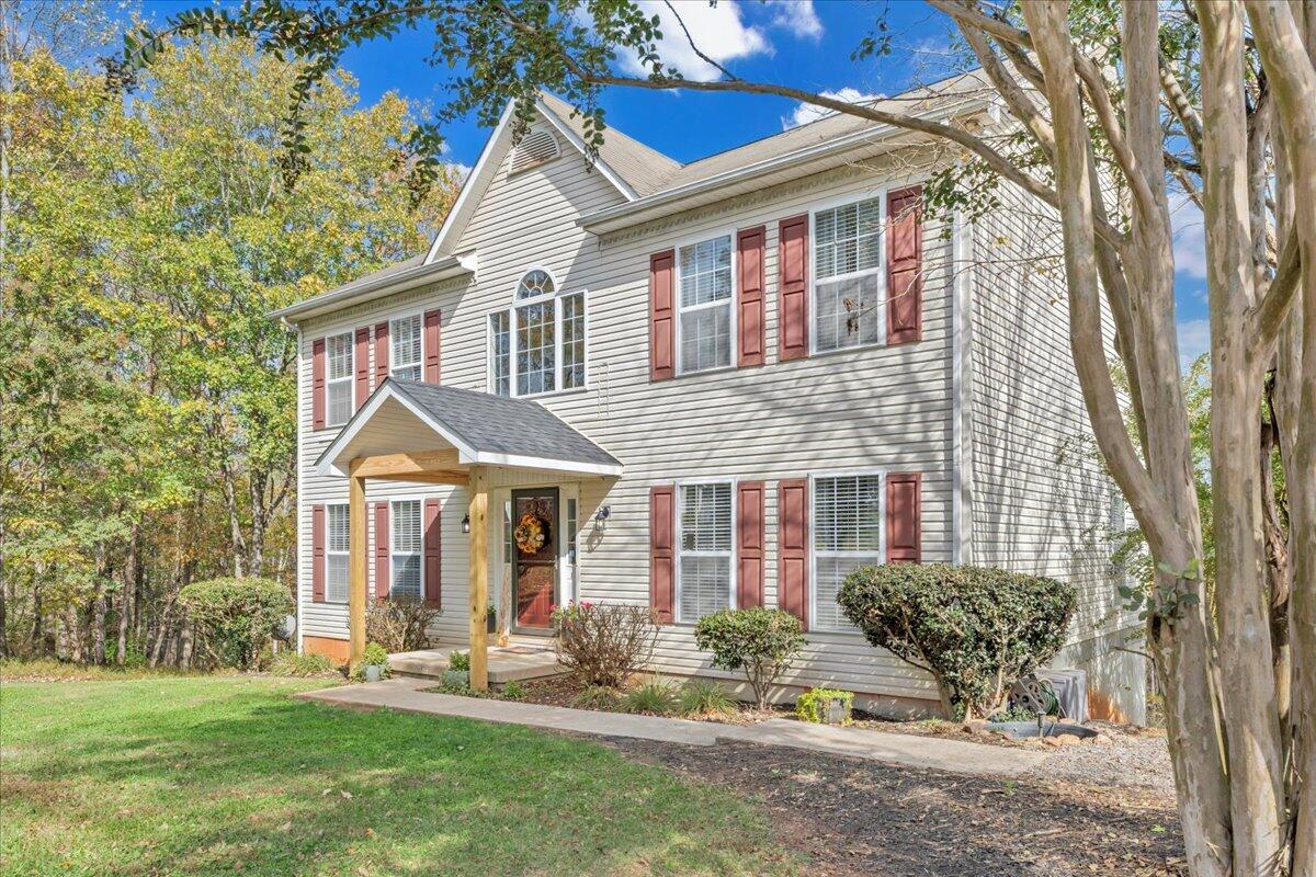 780 Farmington Road Hardy, VA 24101 - Photo 6 of 50 a front view of a house with a yard