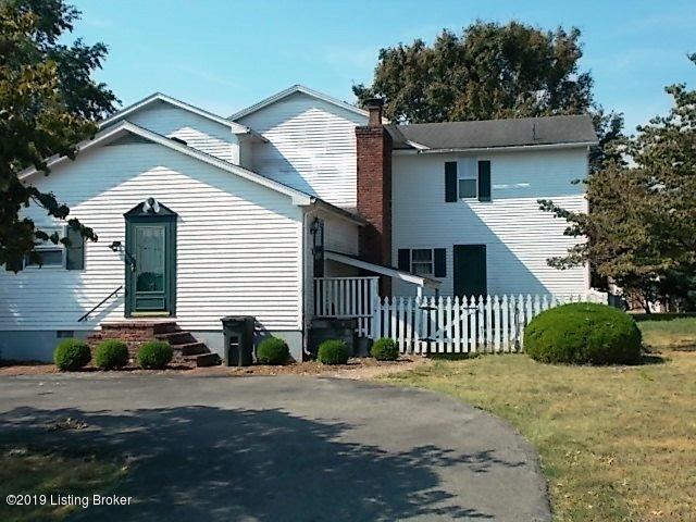 1050 Bloomfield Road Bardstown, KY 40004 - Photo 2 of 27 Side view with blacktop round driveway