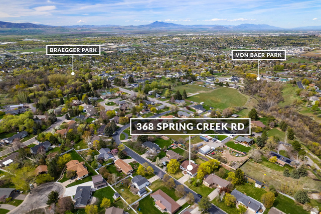 368 Spring Creek Road Providence, UT 84332 - Photo 43 of 45 Aerial view of property's location featuring nearby suburban area, mountains, and property boundaries highlighted