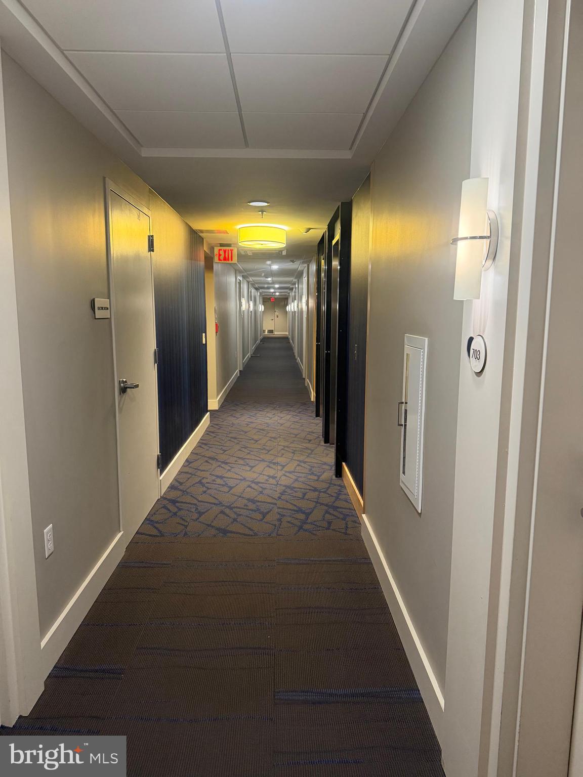 1320 Fenwick Lane, Unit 700 Silver Spring, MD 20910 - Photo 12 of 25 a view of hallway with a glass door