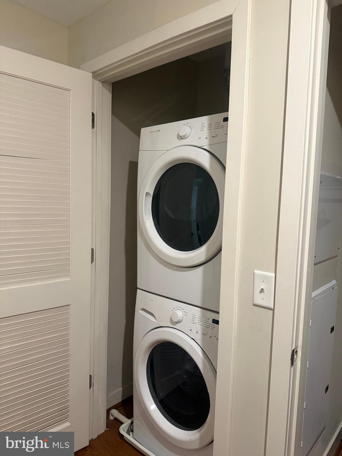 1320 Fenwick Lane, Unit 700 Silver Spring, MD 20910 - Photo 14 of 25 a view of a hallway with washer and dryer