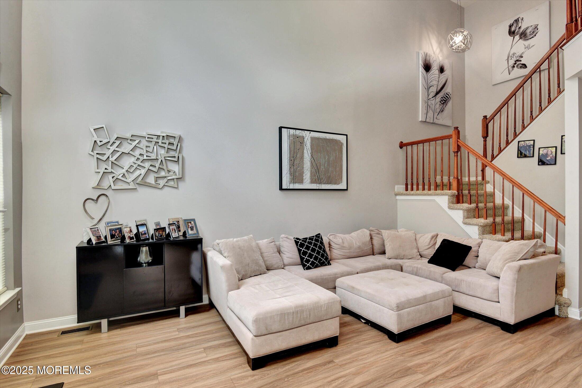45 Brookfield Drive Jackson, NJ 08527 - Photo 12 of 39 a living room with furniture and wooden floor