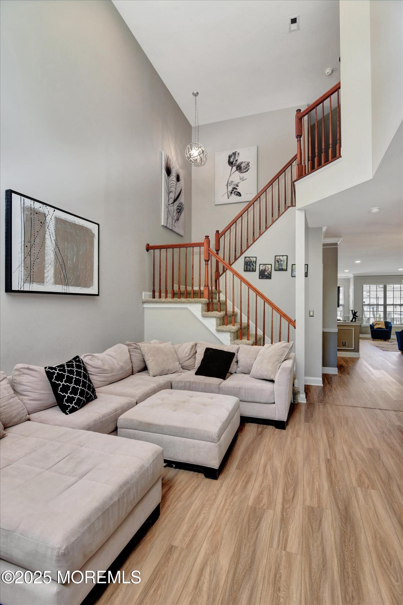 45 Brookfield Drive Jackson, NJ 08527 - Photo 14 of 39 a living room with furniture and a wooden floor