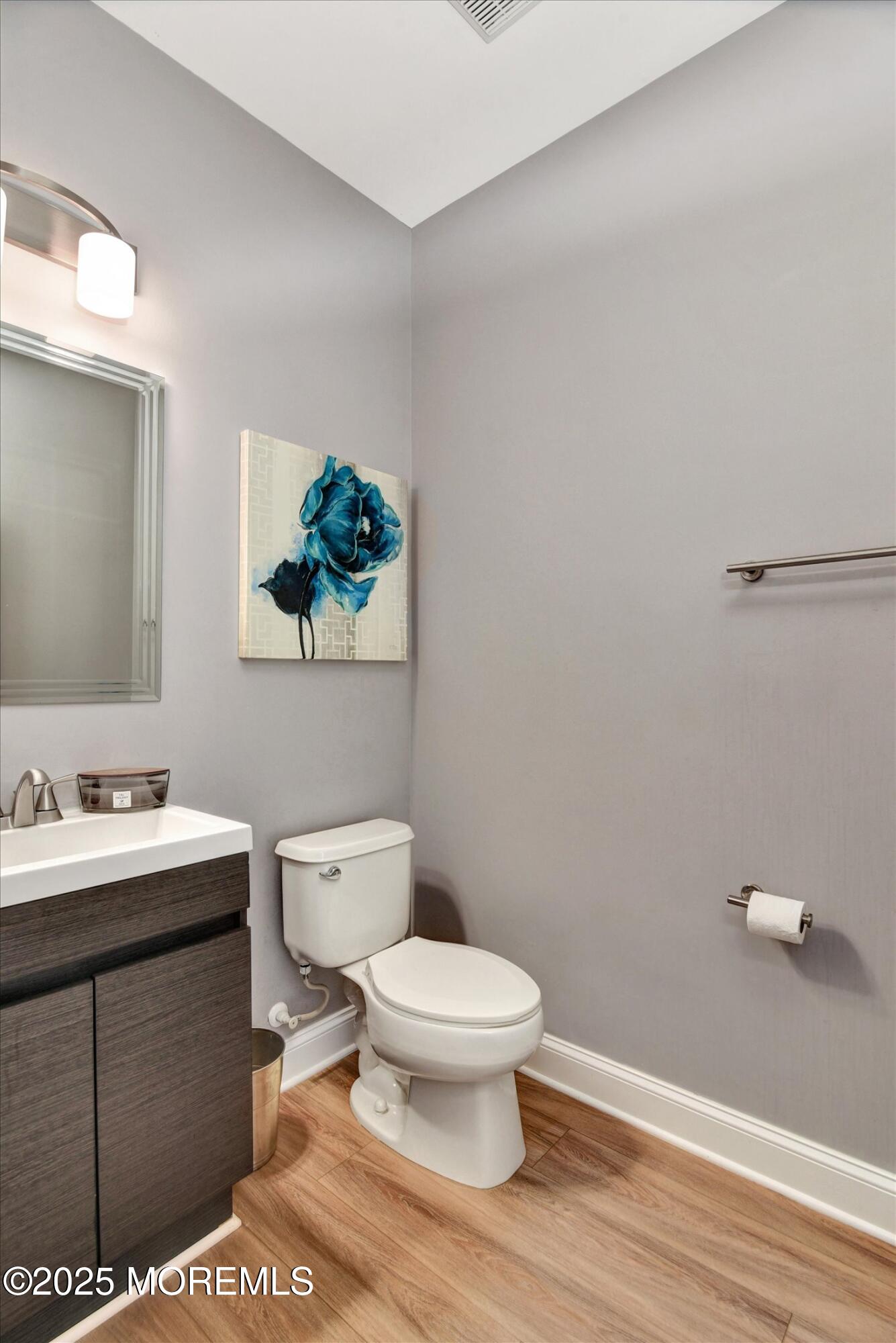 45 Brookfield Drive Jackson, NJ 08527 - Photo 20 of 39 a bathroom with a toilet a sink and mirror