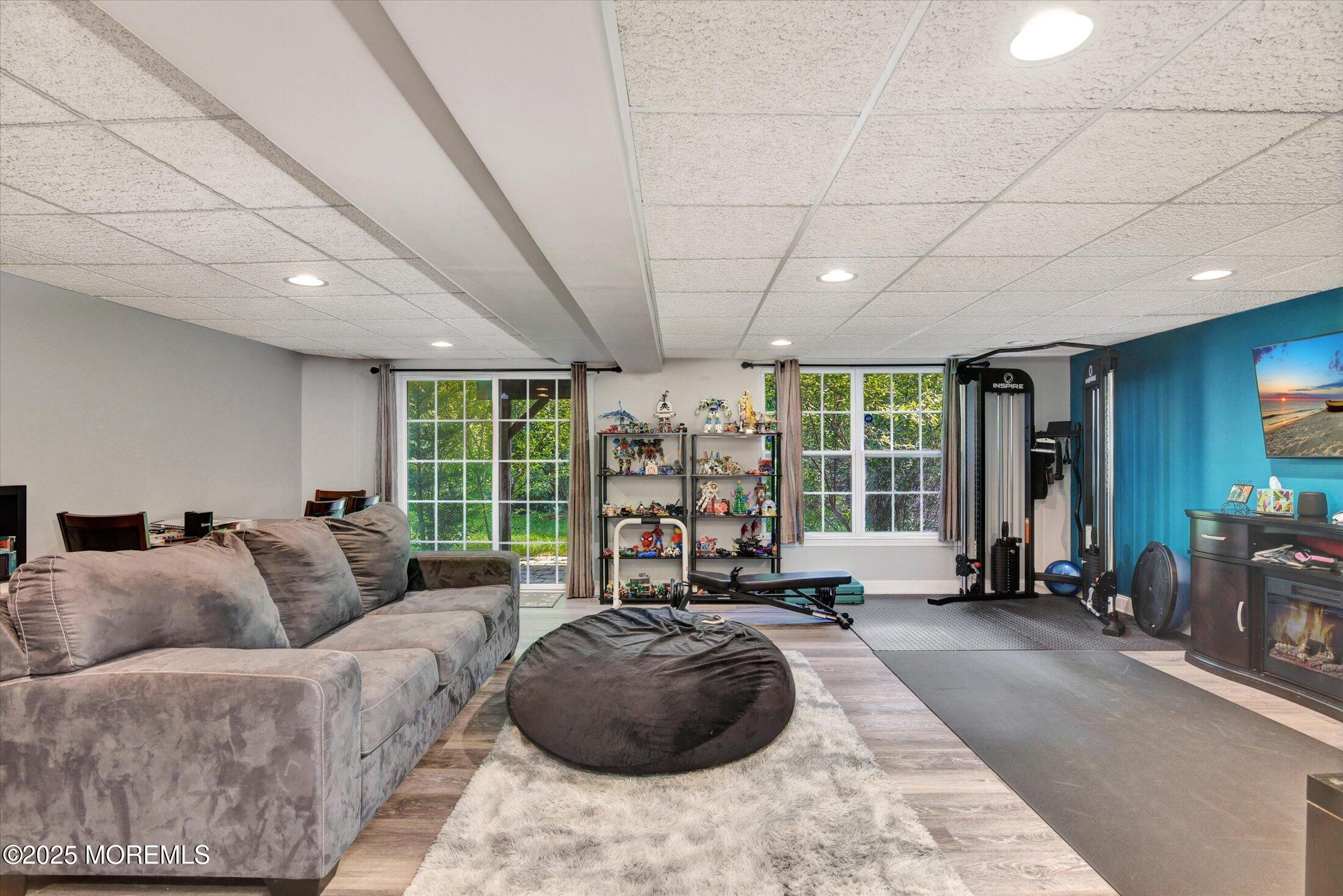 45 Brookfield Drive Jackson, NJ 08527 - Photo 31 of 39 a living room with furniture and a large window