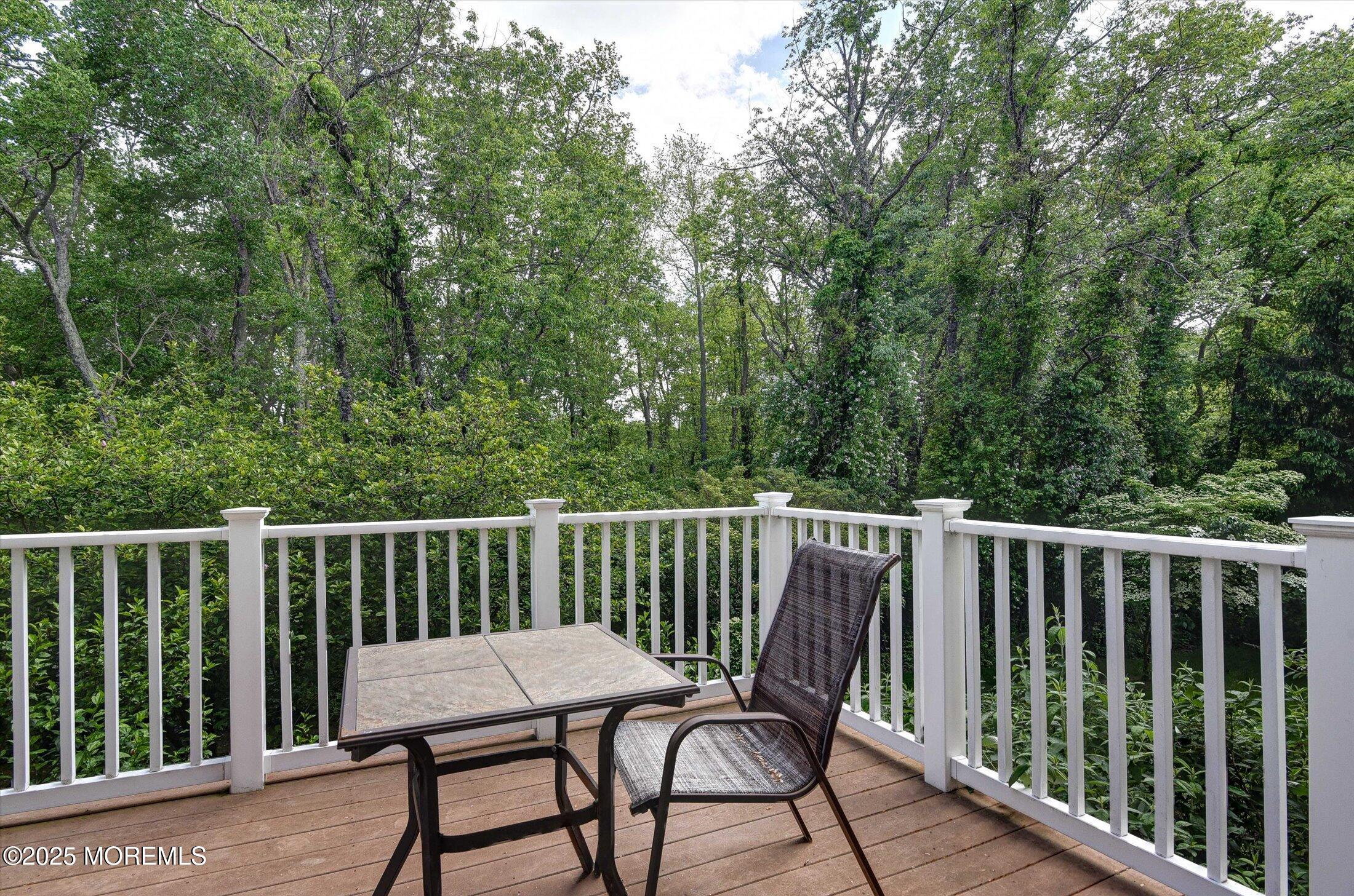 45 Brookfield Drive Jackson, NJ 08527 - Photo 33 of 39 a view of a chair in a balcony