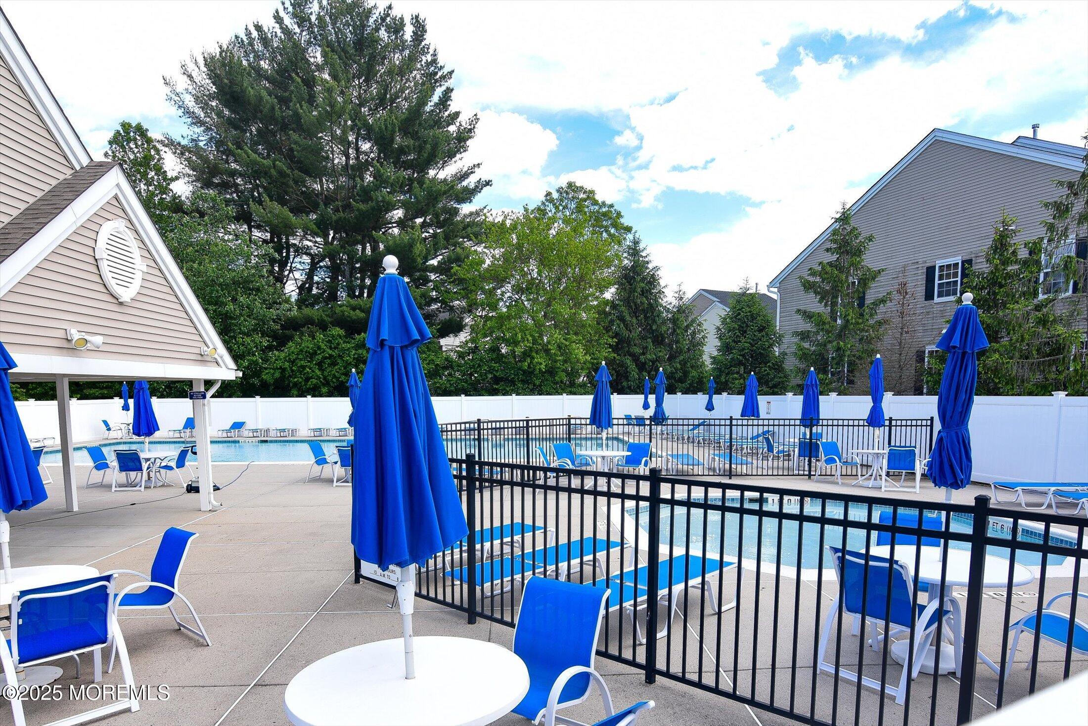 45 Brookfield Drive Jackson, NJ 08527 - Photo 38 of 39 a view of a chairs and tables in the balcony