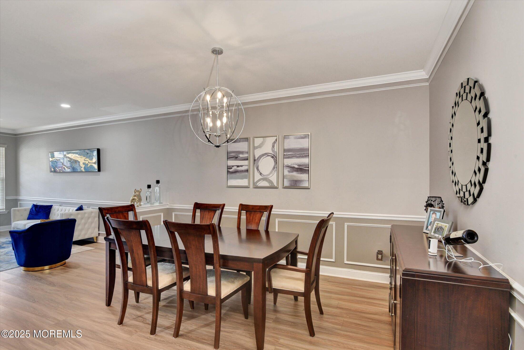 45 Brookfield Drive Jackson, NJ 08527 - Photo 8 of 39 a view of a dining room with furniture and wooden floor