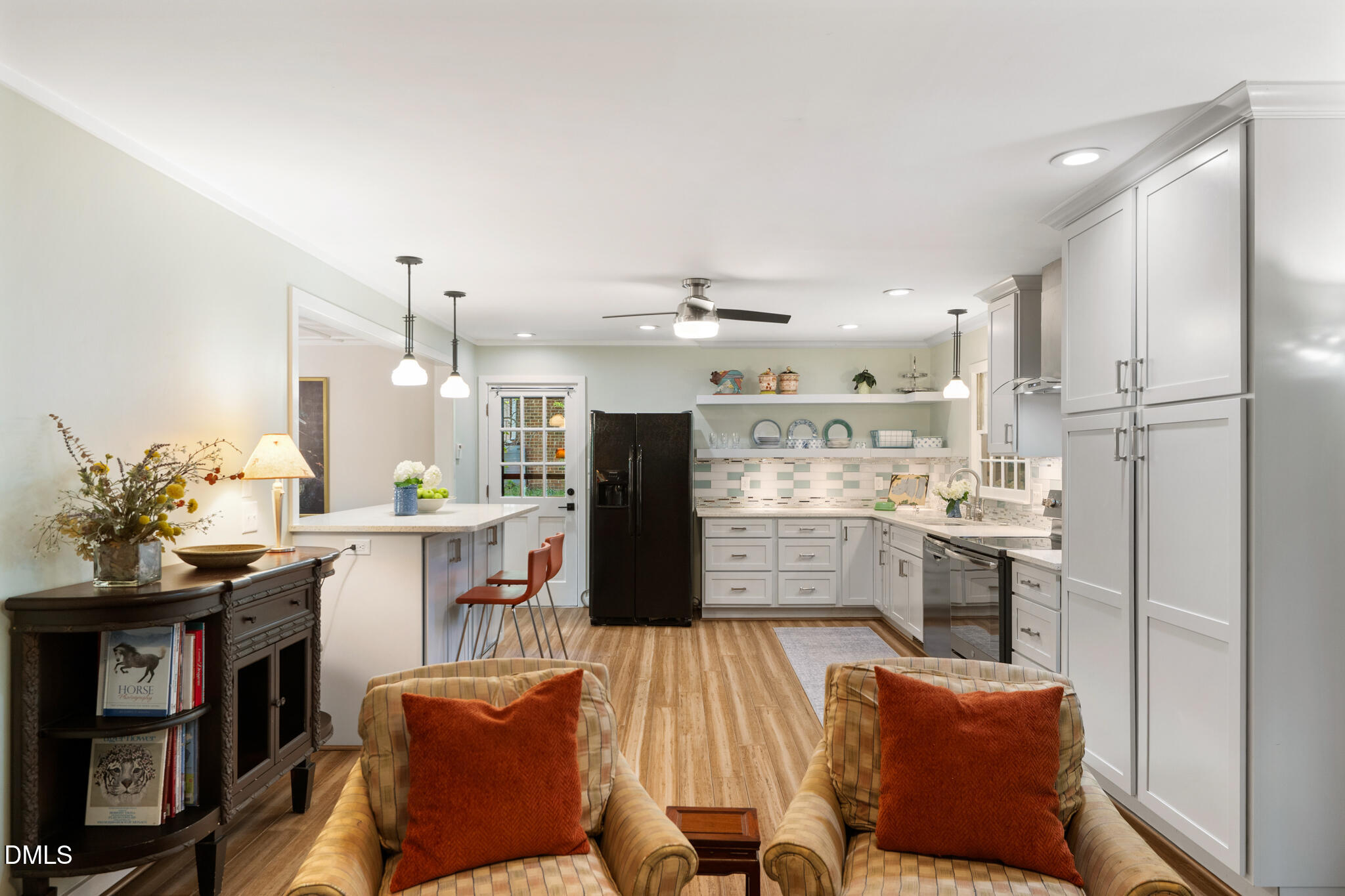 1902 White Plains Road Chapel Hill, NC 27517 - Photo 21 of 53 a kitchen with stainless steel appliances granite countertop a refrigerator and a stove top oven