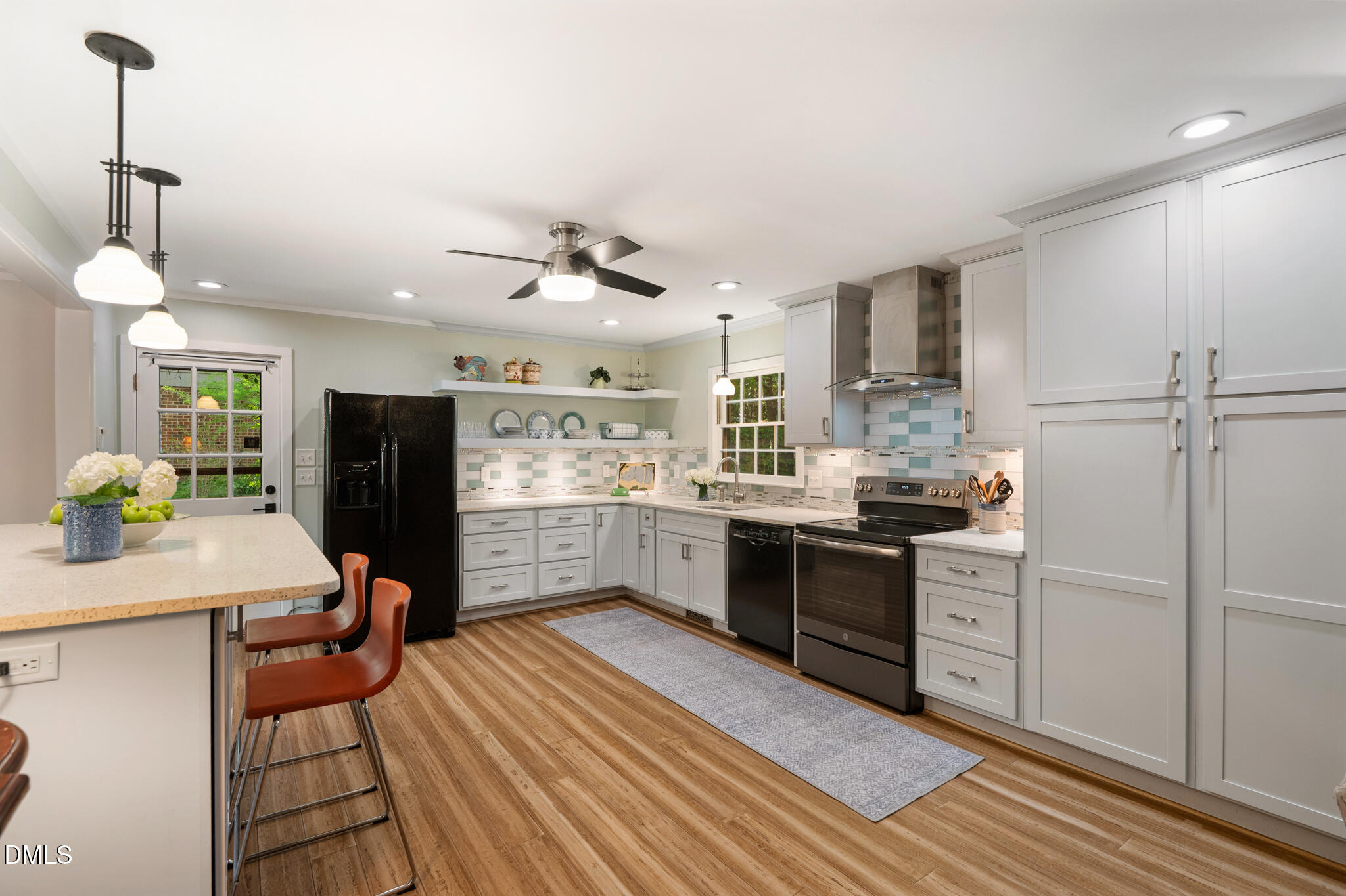 1902 White Plains Road Chapel Hill, NC 27517 - Photo 22 of 53 a kitchen with a refrigerator and a sink