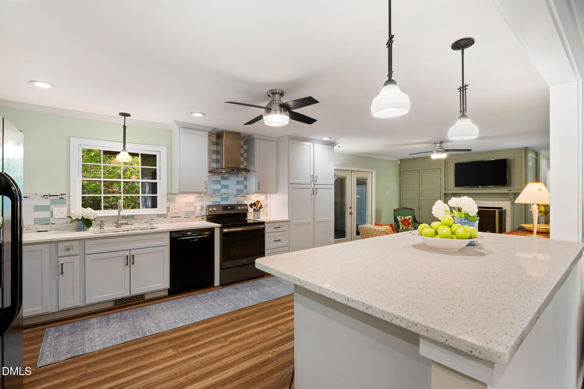 1902 White Plains Road Chapel Hill, NC 27517 - Photo 24 of 53 a large kitchen with granite countertop a stove and a sink
