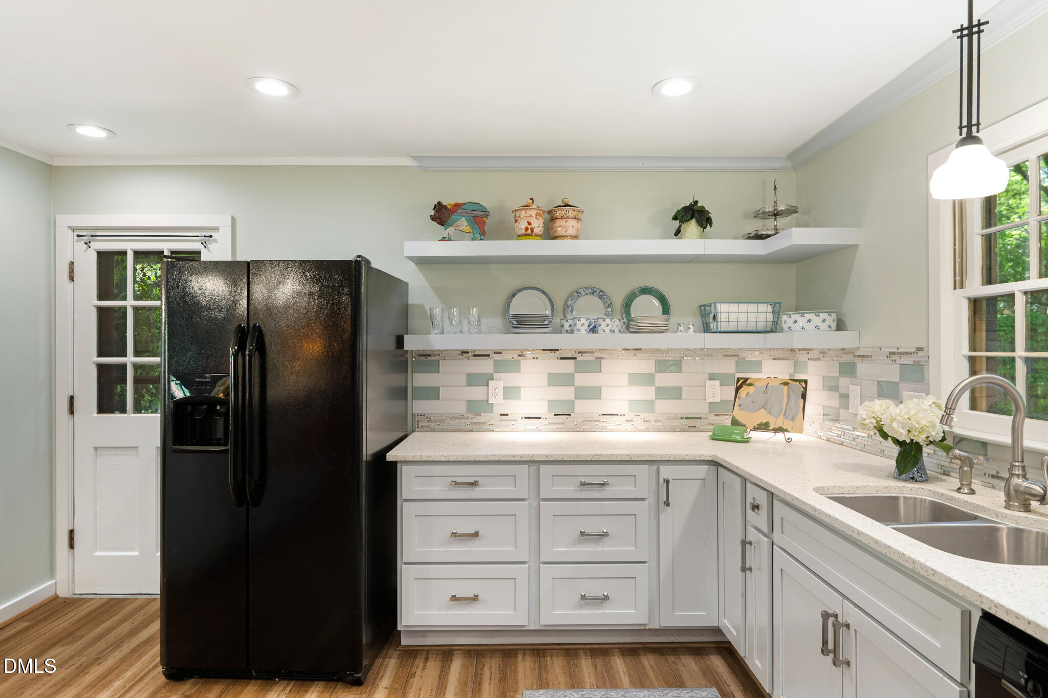 1902 White Plains Road Chapel Hill, NC 27517 - Photo 26 of 53 a kitchen with a refrigerator and cabinets