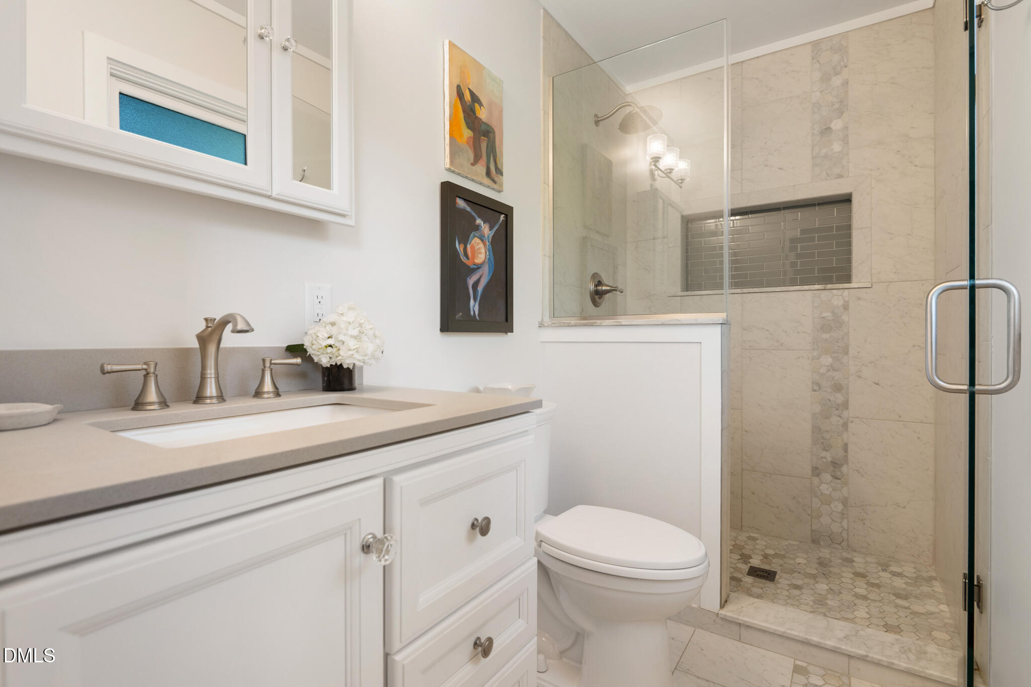 1902 White Plains Road Chapel Hill, NC 27517 - Photo 30 of 53 a bathroom with a granite countertop sink mirror vanity and toilet