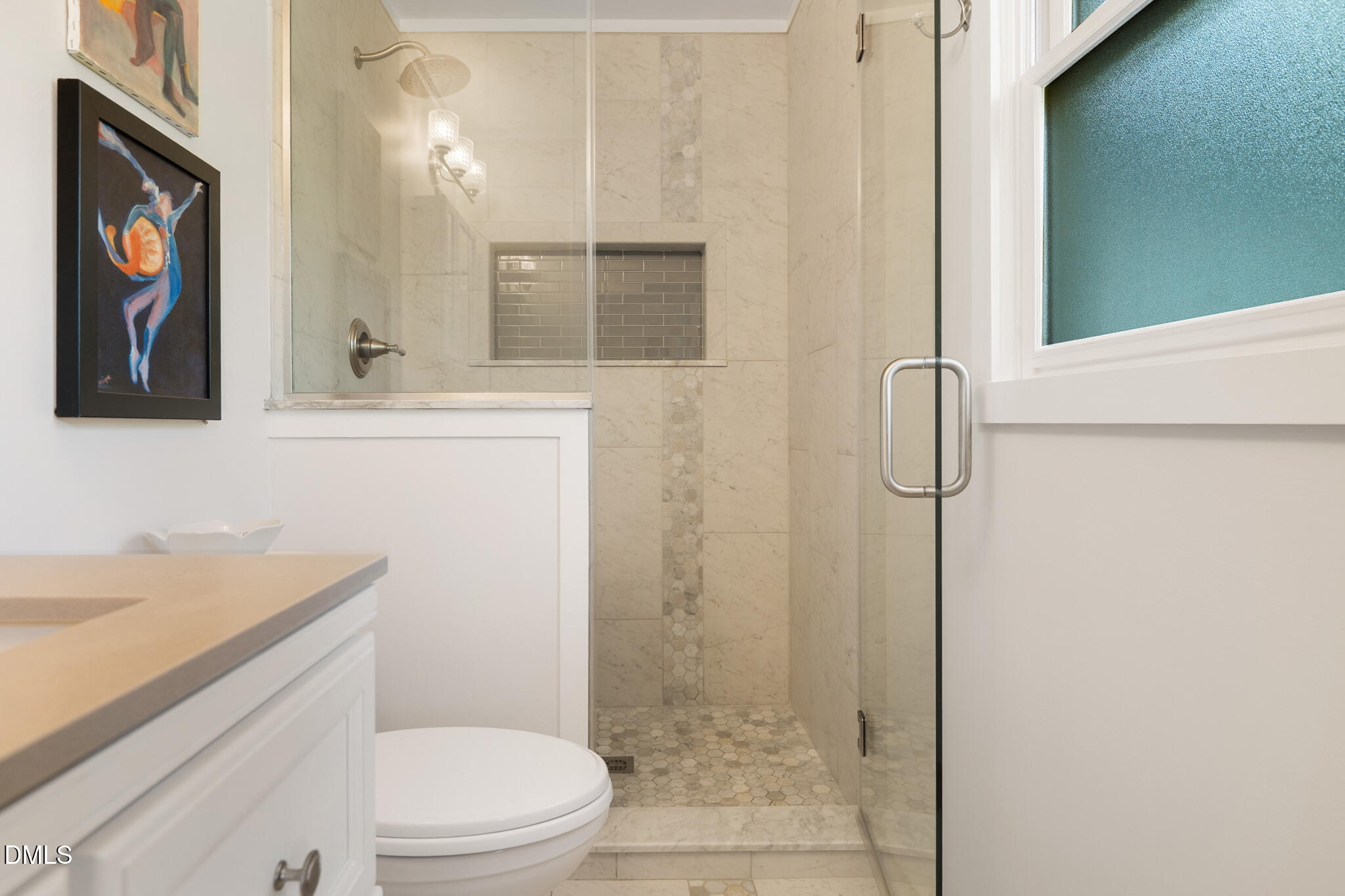 1902 White Plains Road Chapel Hill, NC 27517 - Photo 31 of 53 a bathroom with a toilet a sink a shower and mirror