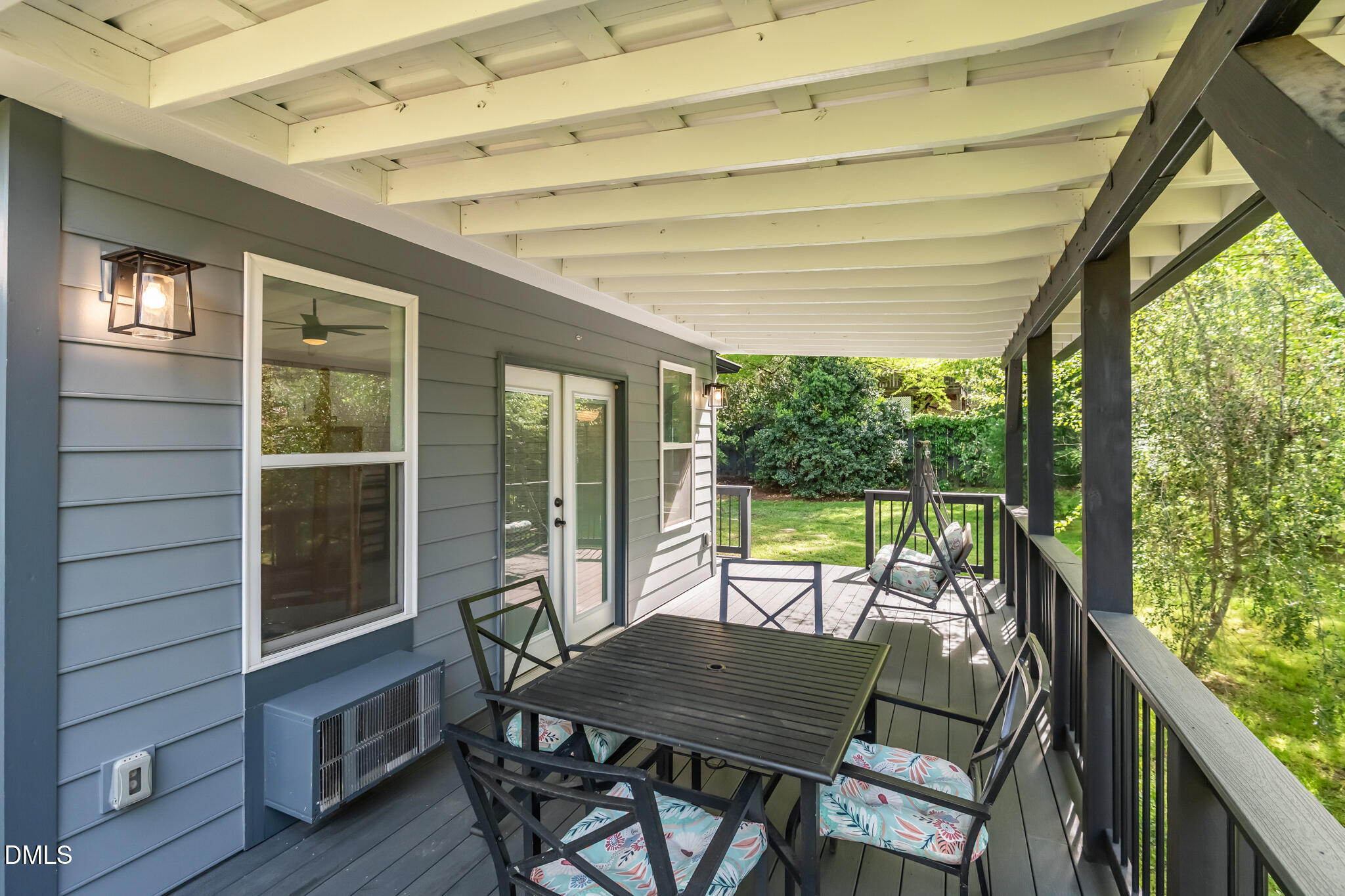 1902 White Plains Road Chapel Hill, NC 27517 - Photo 46 of 53 a view of a porch with furniture and wooden floor