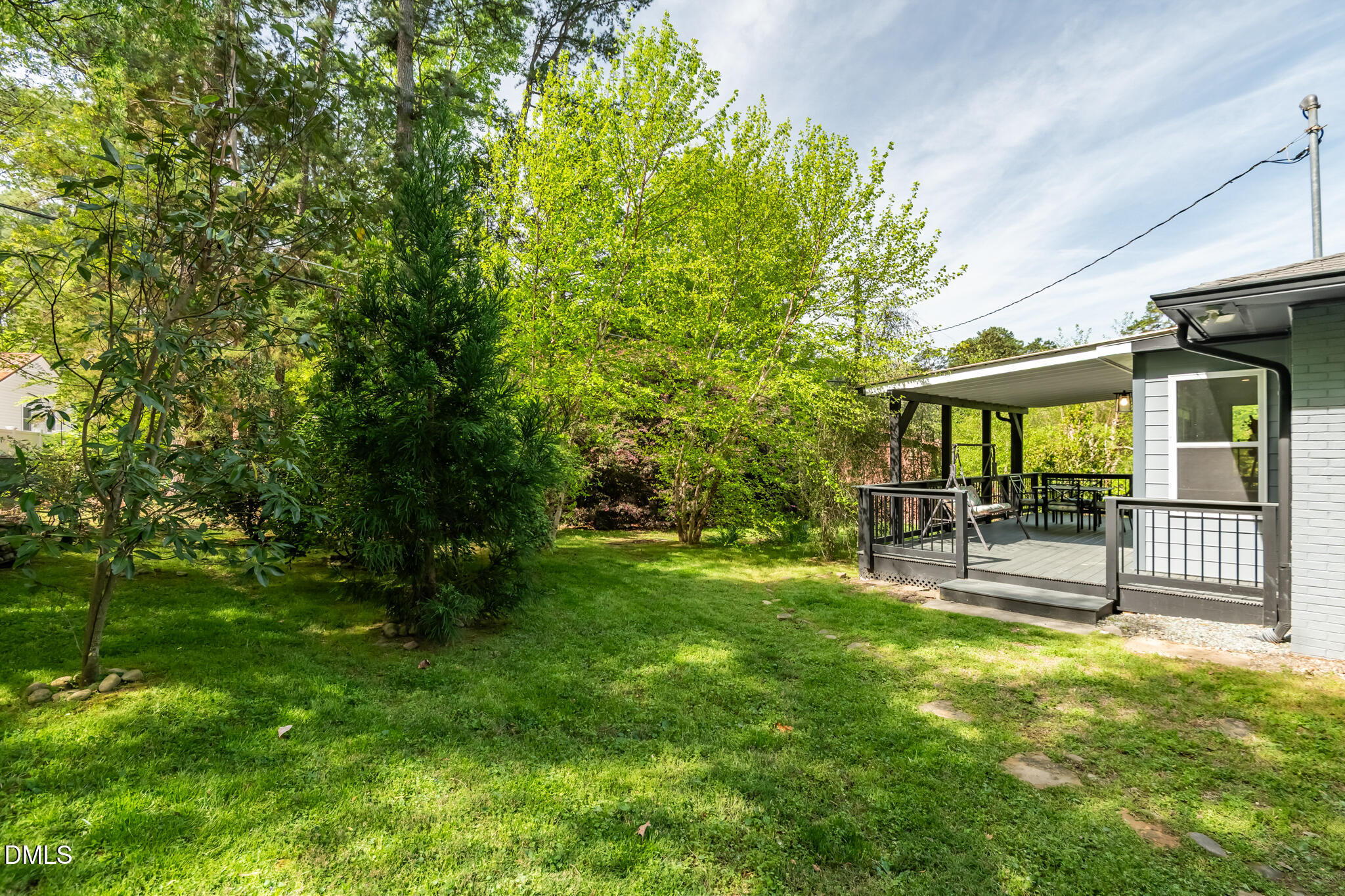 1902 White Plains Road Chapel Hill, NC 27517 - Photo 48 of 53 a view of a house with a yard porch and sitting area