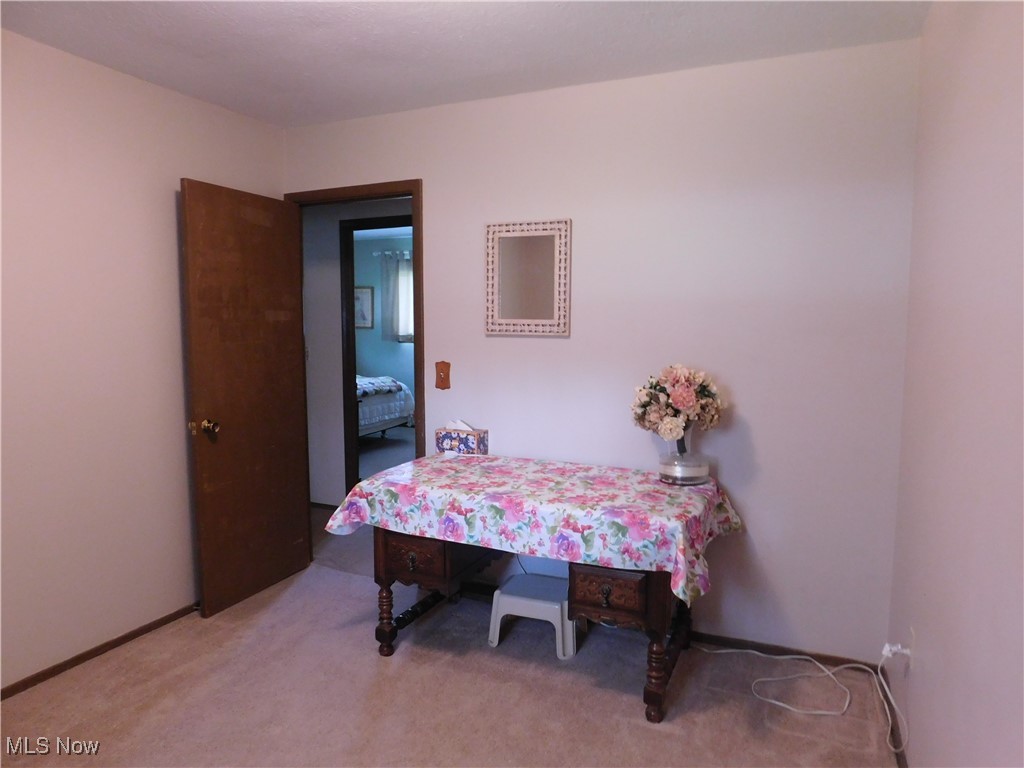 9255 Root Road North Ridgeville, OH 44039 - Photo 30 of 46 Dining space with light colored carpet
