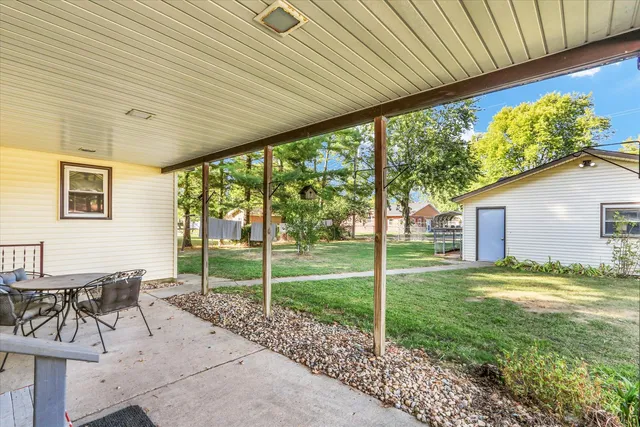 a view of backyard with green space