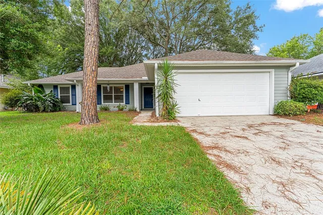 front view of a house with a yard