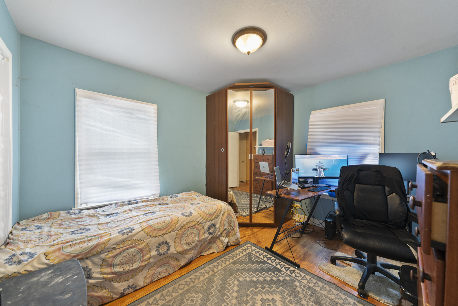 11030 Austin Avenue Chicago Ridge, IL 60415 - Photo 11 of 17 a bedroom with furniture and a window