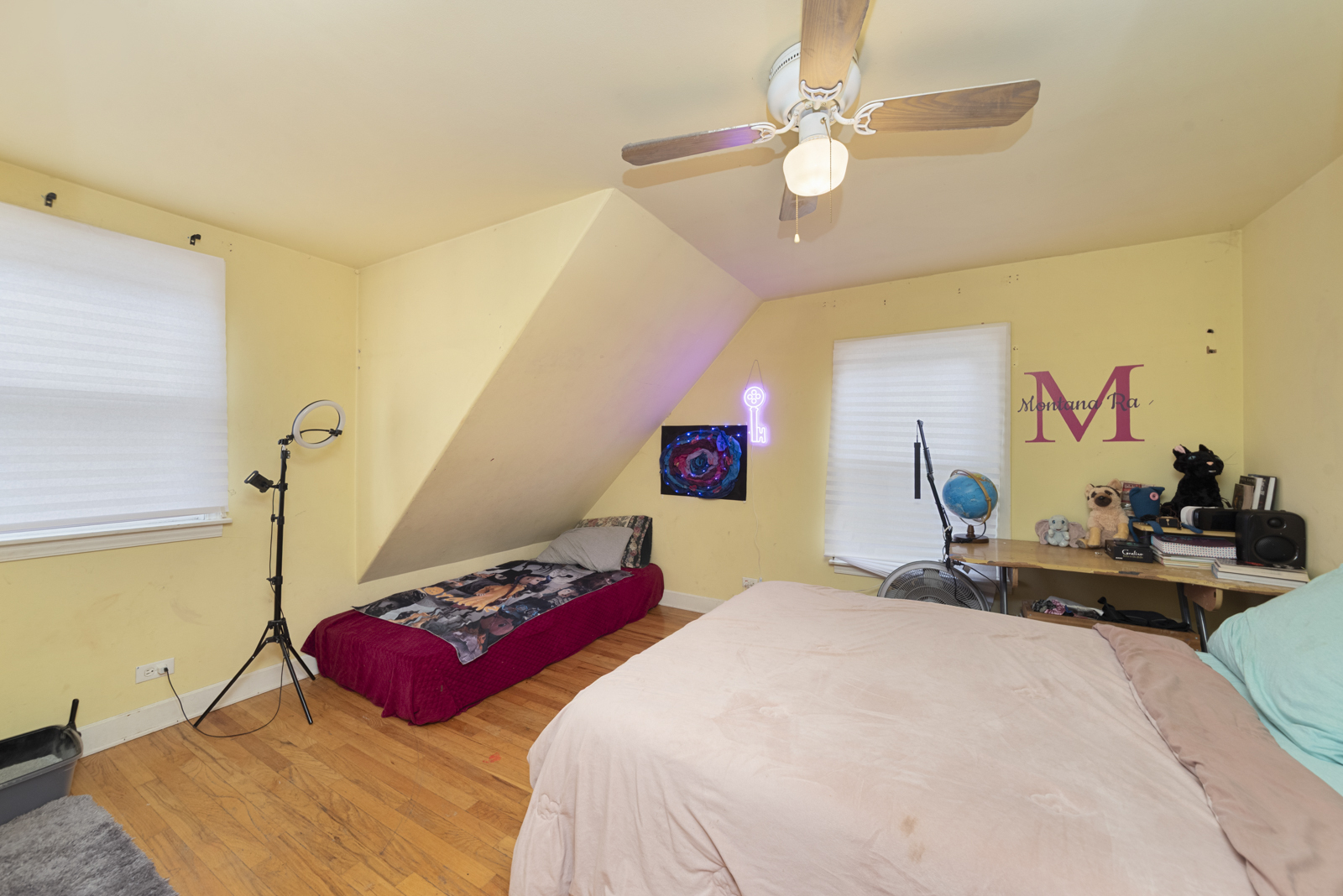 11030 Austin Avenue Chicago Ridge, IL 60415 - Photo 16 of 17 a bedroom with a bed and a chandelier