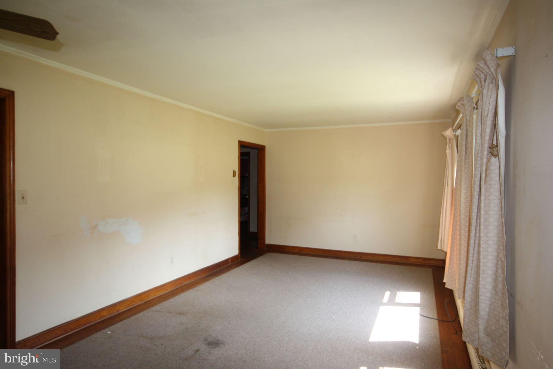 9660 Tilghman Island Road McDaniel, MD 21647 - Photo 2 of 11 Living room / dining room