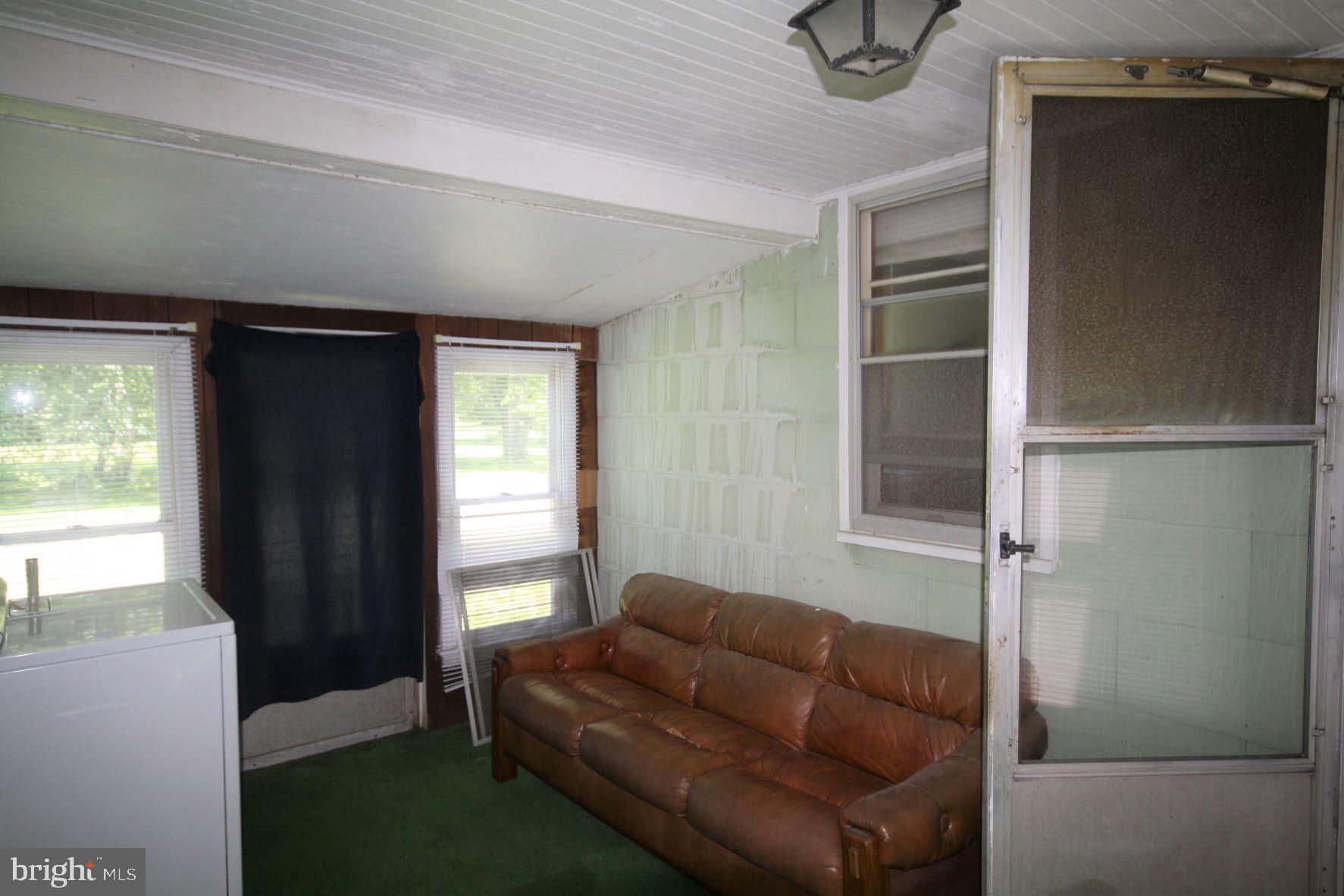 9660 Tilghman Island Road McDaniel, MD 21647 - Photo 7 of 11 Enclosed breezeway