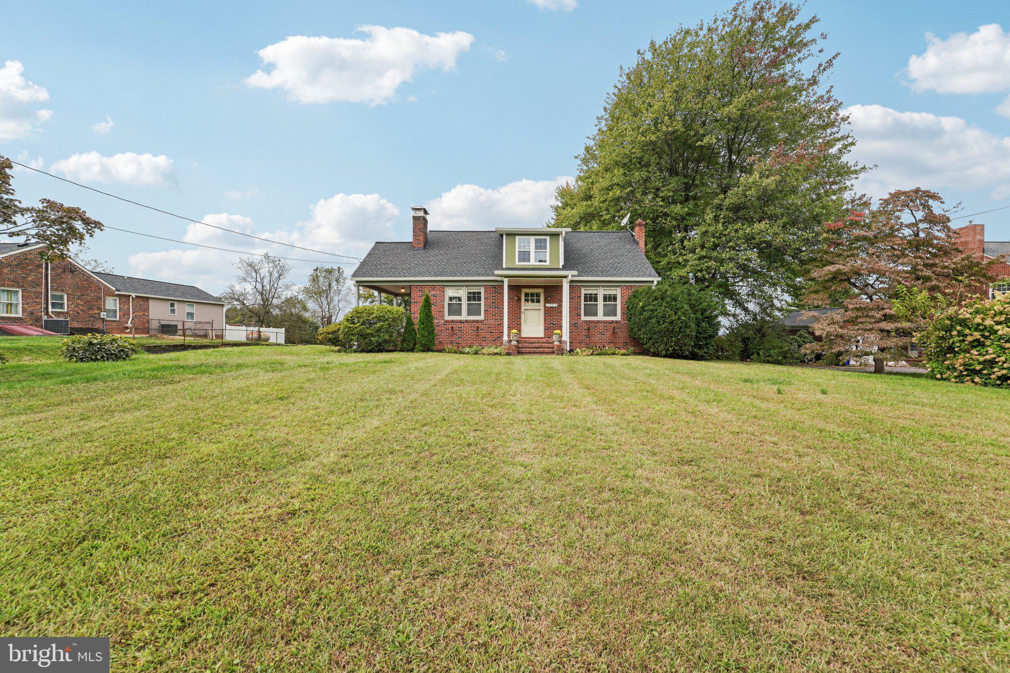 1008 North Main Street Mount Airy, MD 21771 - Photo 2 of 52 front view of a house with a yard