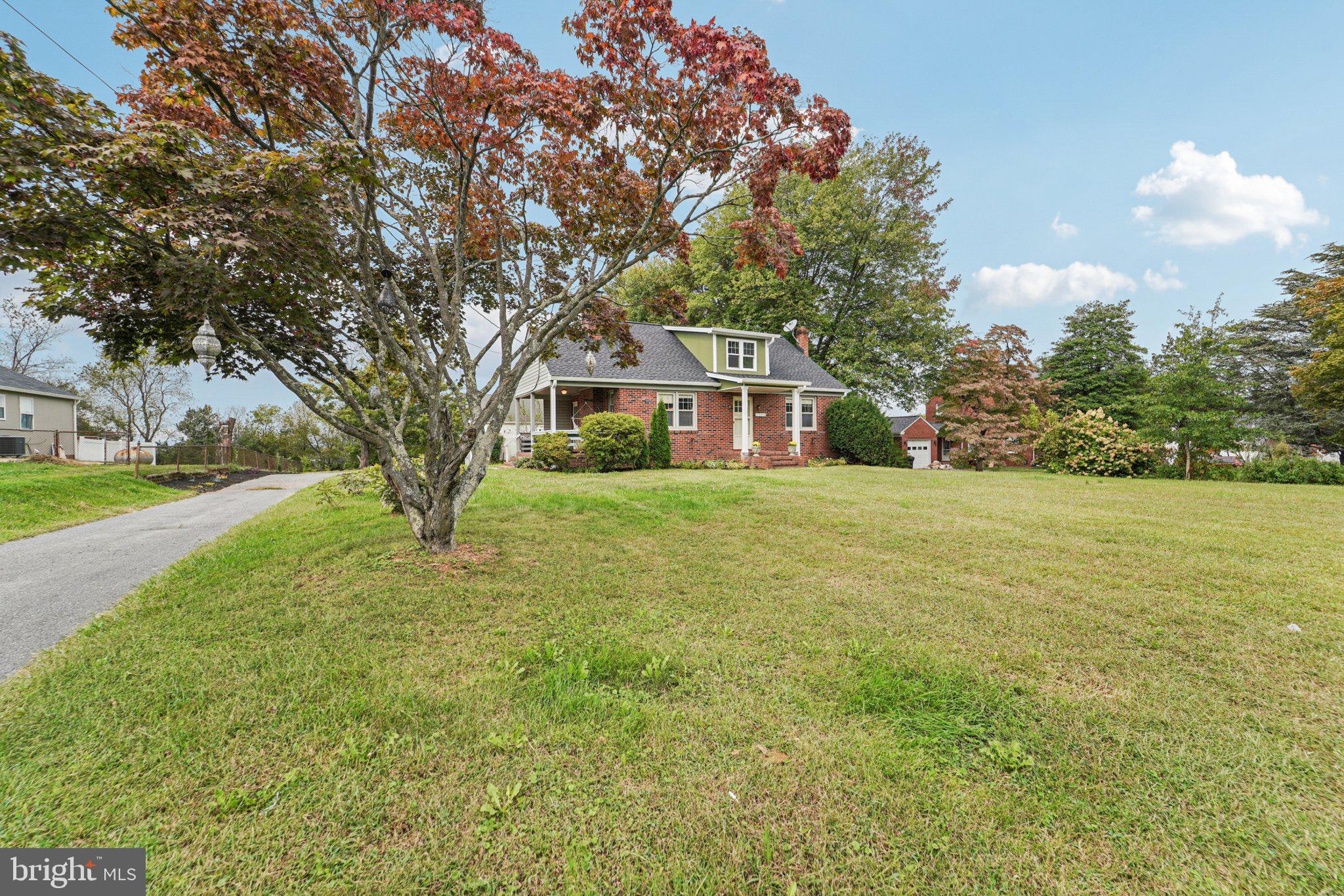 1008 North Main Street Mount Airy, MD 21771 - Photo 3 of 52 a house view with swimming pool in front of it