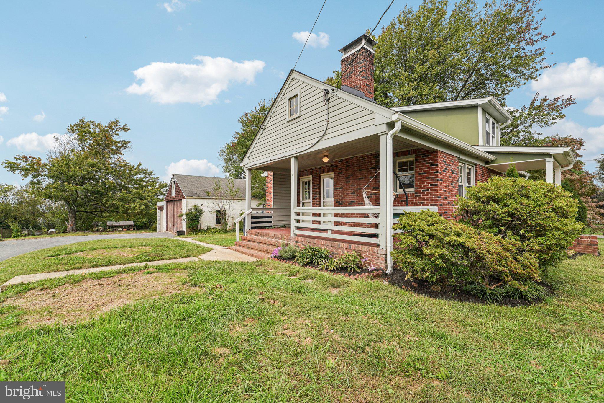 1008 North Main Street Mount Airy, MD 21771 - Photo 4 of 52 a view of a house with a yard