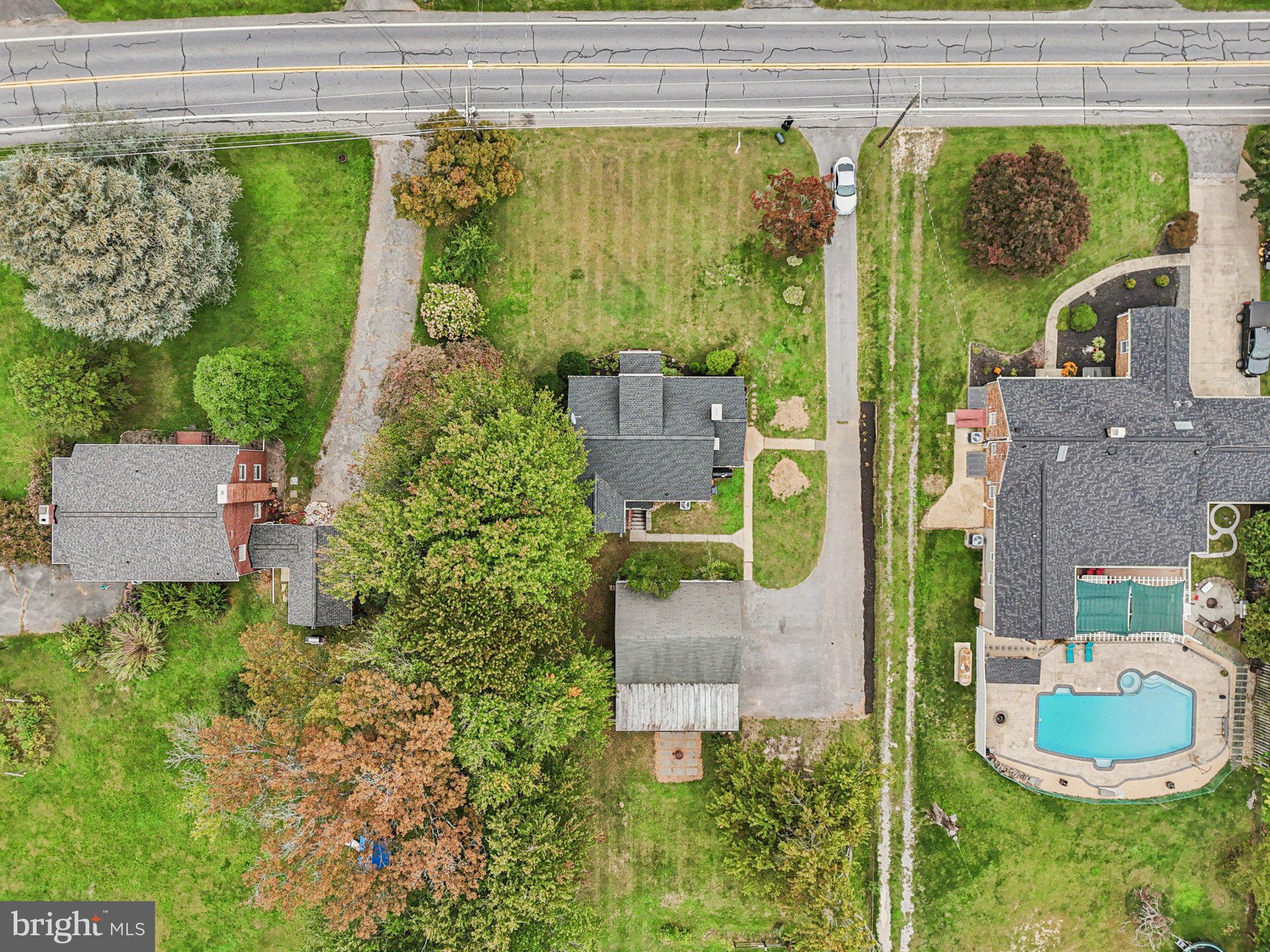 1008 North Main Street Mount Airy, MD 21771 - Photo 47 of 52 an aerial view of a house with a yard and a fountain