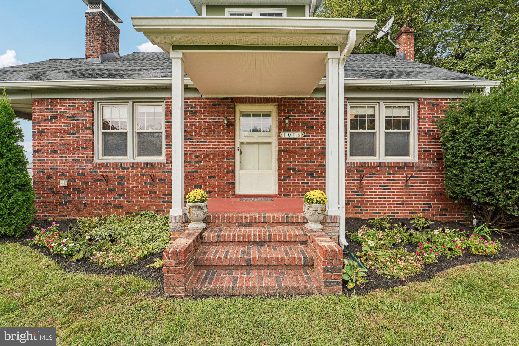 1008 North Main Street Mount Airy, MD 21771 - Photo 5 of 52 front view of a house with a yard