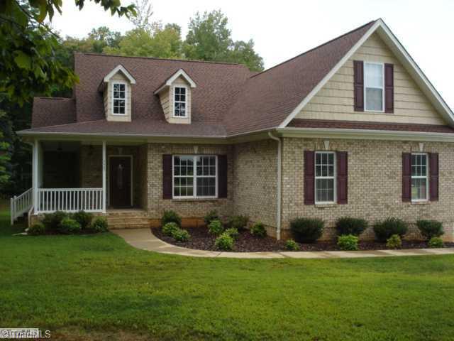 7405 Friendship Church Road Browns Summit, NC 27214 - Photo 1 of 12 Exterior Front. Front and side with porch