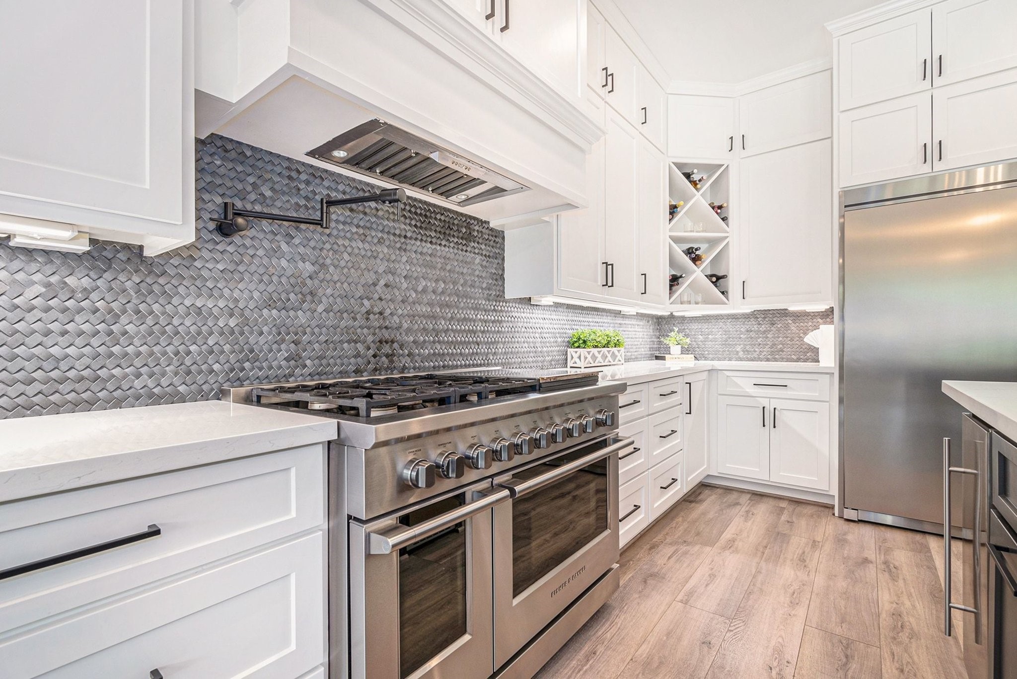 111 Seagull Path Point Blank, TX 77364 - Photo 18 of 50 Top of the line double oven with 6 burner gas grill and pot-filler.