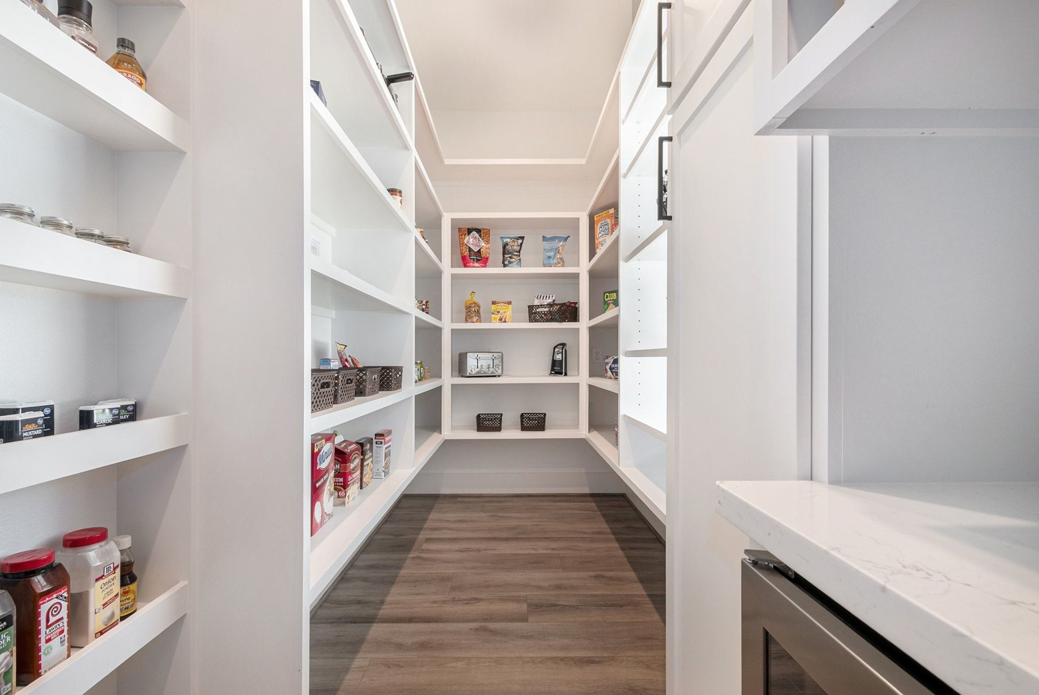 111 Seagull Path Point Blank, TX 77364 - Photo 19 of 50 Huge pantry with built in microwave, wine fridge & coffee bar!