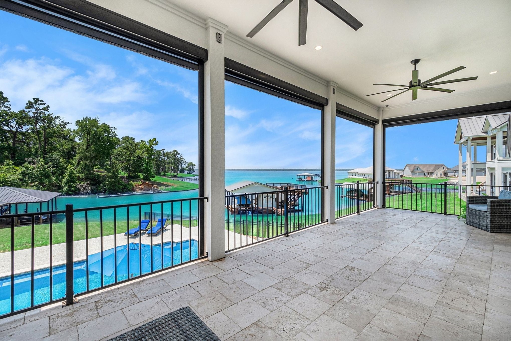 111 Seagull Path Point Blank, TX 77364 - Photo 2 of 49 a view of a porch with a floor to ceiling window
