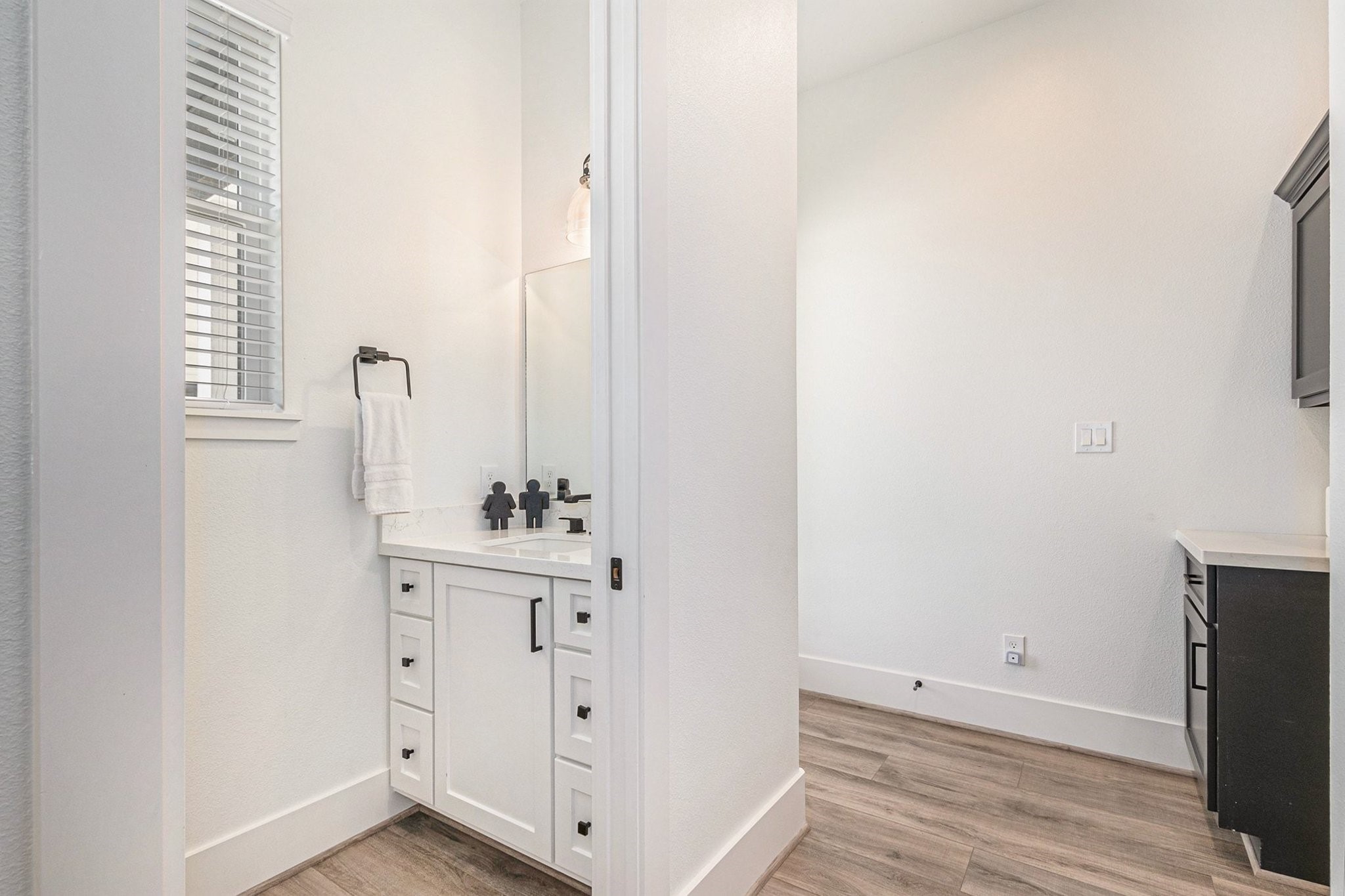 111 Seagull Path Point Blank, TX 77364 - Photo 24 of 50 Half bath on the main floor - secondary entrance behind there.